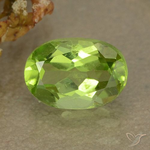 1.2 ct Oval Cut Peridot, 7.7 x 5.4 mm From China, Photo A