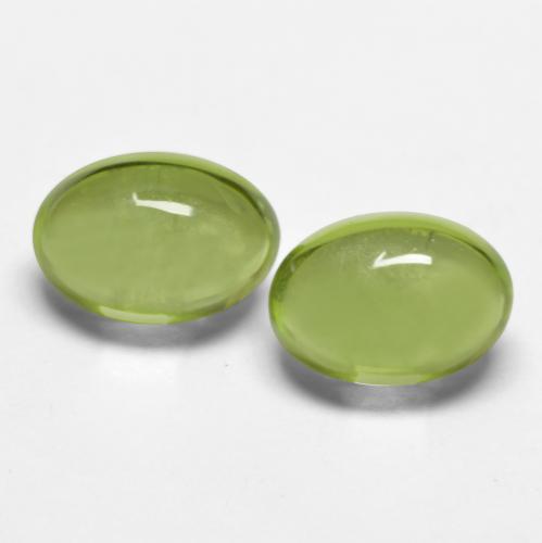 Yellowish Green Peridot Gem - 0.6ct Oval Cabochon (ID: 574050)
