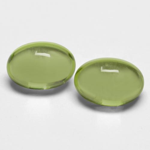 Earth Green Peridot Gem - 0.6ct Oval Cabochon (ID: 574051)