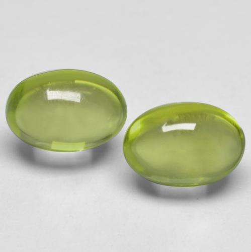 Light Green Peridot Gem - 0.6ct Oval Cabochon (ID: 574055)