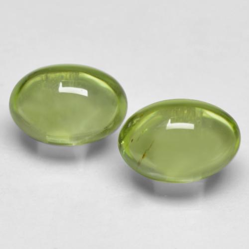 Light Green Peridot Gem - 0.6ct Oval Cabochon (ID: 574058)