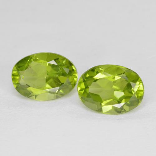 2pc Matching Oval Green Peridots in Size 8.2 x 5.9mm, Weight 2.97ct total / avg. 1.49ct each, Lively Green in VS Clarity, Natural untreated Gemstone, Mohs Hardness 6.5 - 7 suitable for daily wear jewelry, Photo A