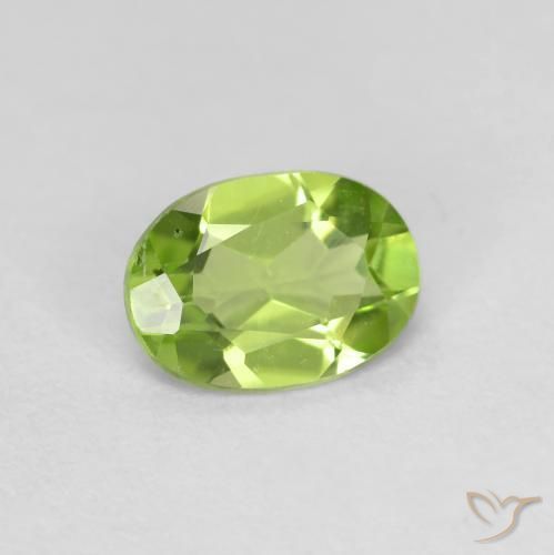 0.71 ct Green Peridot Stone, Natural Peridot in Oval Facet Shape for Sale