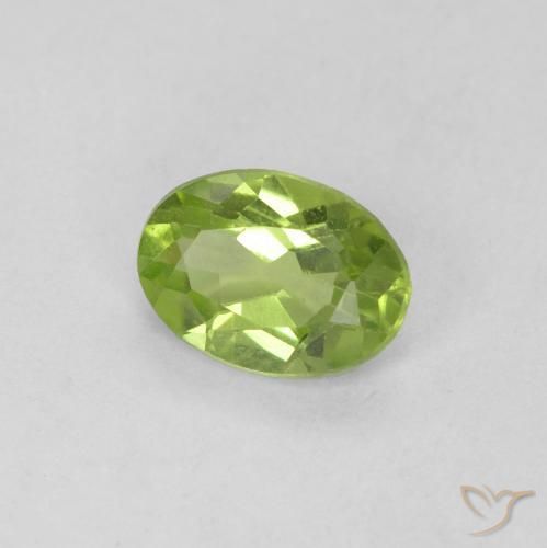 0.59 ct Green Peridot Stone, Natural Peridot in Oval Facet Shape for Sale