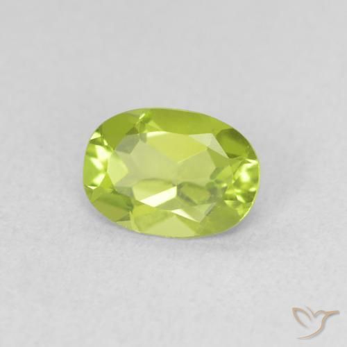 0.79 ct Green Peridot Stone, Natural Peridot in Oval Facet Shape for Sale