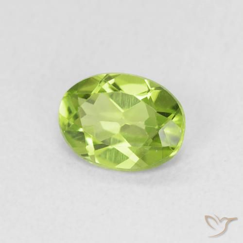 0.69 ct Green Peridot Stone, Natural Peridot in Oval Facet Shape for Sale
