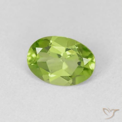 0.77 ct Green Peridot Stone, Natural Peridot in Oval Facet Shape for Sale