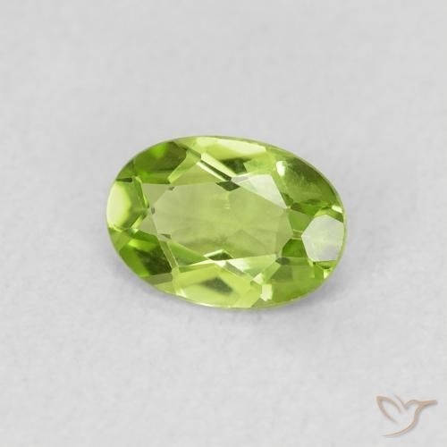 0.69 ct Green Peridot Stone, Natural Peridot in Oval Facet Shape for Sale