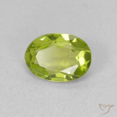 0.68 ct Green Peridot Stone, Natural Peridot in Oval Facet Shape for Sale