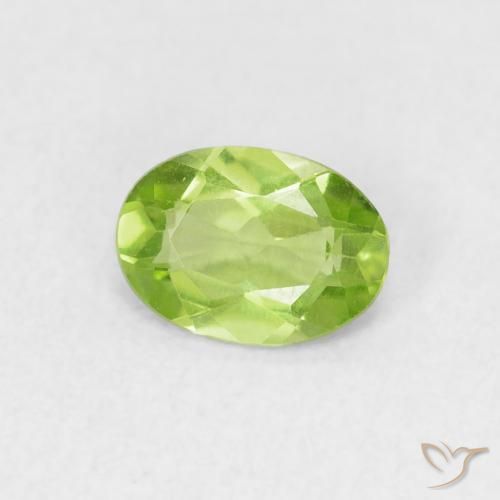 0.71 ct Green Peridot Stone, Natural Peridot in Oval Facet Shape for Sale