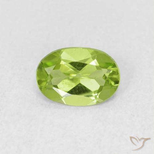 0.71 ct Green Peridot Gemstone, Peridot Gem in Oval Facet Shape for Sale.