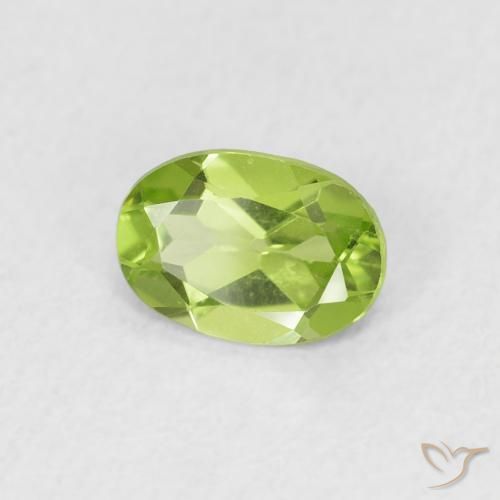 0.71 ct Green Peridot Stone, Natural Peridot in Oval Facet Shape for Sale