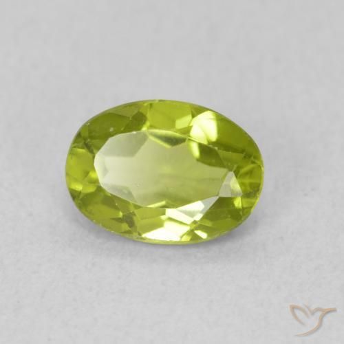 0.82 ct Green Peridot Stone, Natural Peridot in Oval Facet Shape for Sale