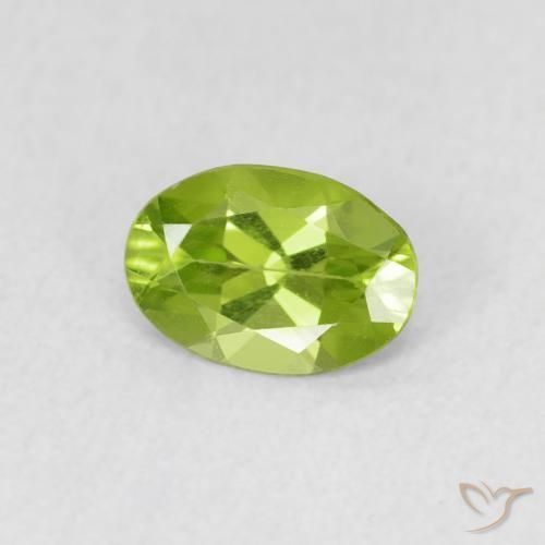 0.67 ct Green Peridot Stone, Natural Peridot in Oval Facet Shape for Sale