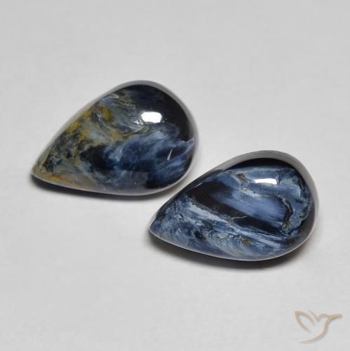 2 pezzi Pietersite taglio pera abbinati di dimensioni 9,8 x 6,5mm, peso 3,56 ct totali / media. 1,78 ct ciascuno, Multicolore in purezza Opaque, pietra preziosa naturale non trattati, durezza Mohs 6,5 - 7 adatto per gioielli da indossare ogni giorno, Photo A