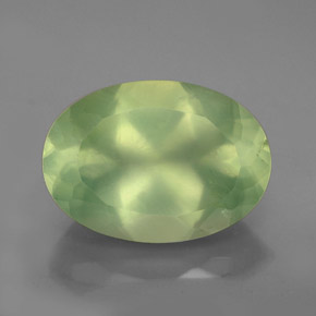 5.97 ct Green Prehnite Gemstone, Prehnite Gem in Oval Facet Shape for Sale.