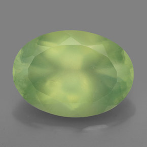 5.86 ct Green Prehnite Gemstone, Prehnite Gem in Oval Facet Shape for Sale.