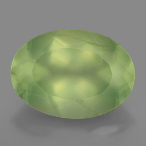 5.86 ct Green Prehnite Gemstone, Prehnite Gem in Oval Facet Shape for Sale.