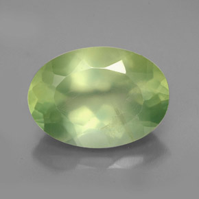 5.72 ct Green Prehnite Gemstone, Prehnite Gem in Oval Facet Shape for Sale.