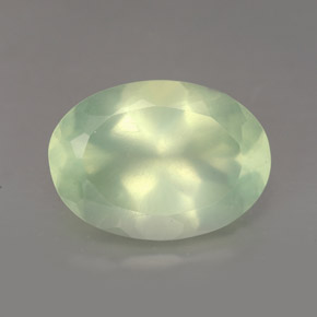 5.76 ct Green Prehnite Gemstone, Prehnite Gem in Oval Facet Shape for Sale.