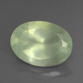 5.61 ct Green Prehnite Gemstone, Prehnite Gem in Oval Facet Shape for Sale.