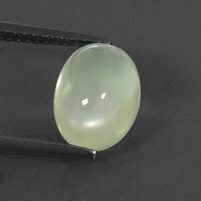 3.09 ct Green Prehnite Gemstone, Prehnite Gem in Oval Cabochon Shape for Sale.