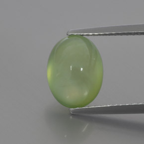 3.82 ct Green Prehnite Gemstone, Prehnite Gem in Oval Cabochon Shape for Sale.