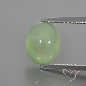 2.81 ct Green Prehnite Gemstone, Prehnite Gem in Oval Cabochon Shape for Sale.