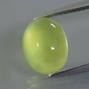 3.53 ct Green Prehnite Gemstone, Prehnite Gem in Oval Cabochon Shape for Sale.