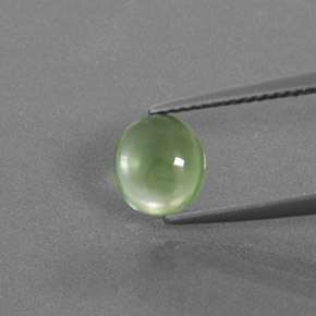 1.35 ct Green Prehnite Gemstone, Prehnite Gem in Oval Cabochon Shape for Sale.