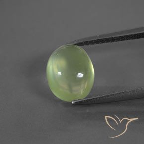 2.98 ct Green Prehnite Gemstone, Prehnite Gem in Oval Cabochon Shape for Sale.