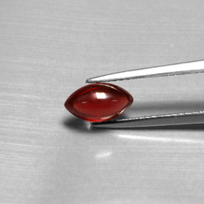 1.39 ct Red Pyrope Garnet Gemstone, Pyrope Garnet Gem in Marquise Cabochon Shape for Sale.