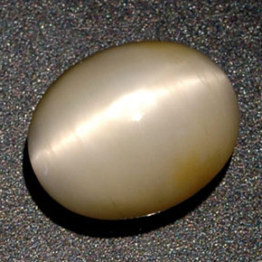 3.38 ct Cream Quartz Cat's Eye Gemstone, Quartz Cat's Eye Gem in Oval Cabochon Shape for Sale.
