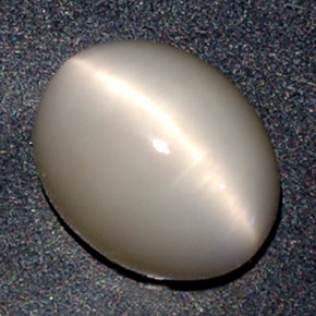 2.84 ct Cream Quartz Cat's Eye Gemstone, Quartz Cat's Eye Gem in Oval Cabochon Shape for Sale.