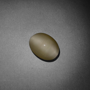 1.64 ct Cream Quartz Cat's Eye Gemstone, Quartz Cat's Eye Gem in Oval Cabochon Shape for Sale.