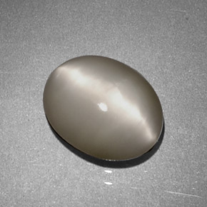 1.97 ct Cream Quartz Cat's Eye Gemstone, Quartz Cat's Eye Gem in Oval Cabochon Shape for Sale.