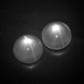 8.74 ctw White Quartz Cat's Eye Gemstones, Quartz Cat's Eye Gems in Round Cabochon Shape for Sale.