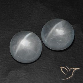 Matching Pair of 10.9mm Round Cabochon White Quartz Cat's Eye, Weight of 12.8ct total / avg. 6.4ct each, Matching Quartz Cat's Eye Pair in Transparent Clarity in Clear White Color, Natural untreated gemstone, Mohs Hardness 7 suitable for daily wear jewelry, Photo A