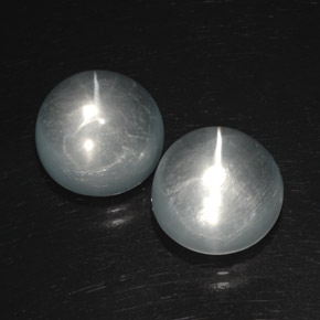 15.4ct Round Cabochon White Quartz Cat's Eye for sale thumb image of 15.4ct Round Cabochon White Quartz Cat's Eye (ID: 369433)