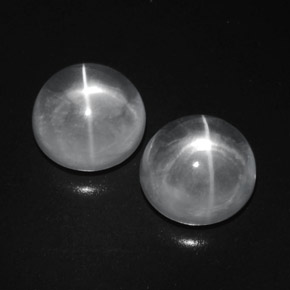 9.41 ctw White Quartz Cat's Eye Gemstones, Quartz Cat's Eye Gems in Round Cabochon Shape for Sale.