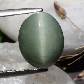 3.39 ct Green Quartz Cat's Eye Gemstone, Quartz Cat's Eye Gem in Oval Cabochon Shape for Sale.