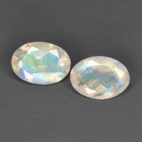 1.40 ctw White Rainbow Moonstone Gemstones, Rainbow Moonstone Gems in Oval Facet Shape for Sale.
