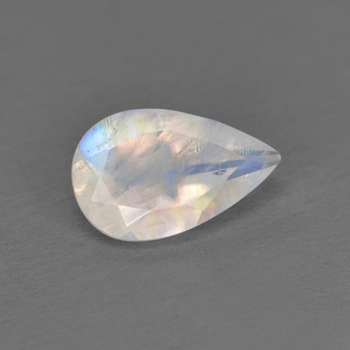 Pierre de Lune Arc en Ciel Blanc pear facet 0,86 ct de l'Inde, dimension 8,3 x 5,2mm, pierre gemme naturelle Non traité, pureté Transparent, 1 pièce Pierre de Lune Arc en Ciel de couleur Blanc bleuâtre, dureté Mohs de 6 à 6.5, Photo A