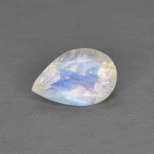 Pierre de Lune Arc en Ciel Blanc bleuâtre Poire 0,77 ct de l'Inde, Dimension 7,8 x 5,2mm, Pierre gemme naturelle Non traité, pureté Transparent, 1 pièce Pierre de Lune Arc en Ciel pear facet, dureté de Mohs de 6 à 6.5, Photo A