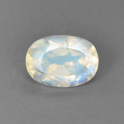 0.92ct Oval Facet White Rainbow Moonstone from United States, Dimension 7.1 x 5mm, Transparent Clarity, Natural untreated gemstone, 1pc Rainbow Moonstone in Bluish White Color, Mohs Hardness of 6 - 6.5, Photo A