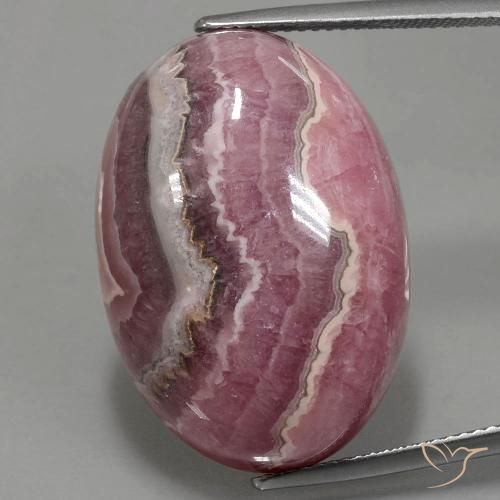 46.95 ct Oval Rhodochrosite, 26.9 x 18.9 mm From South Africa, Photo A