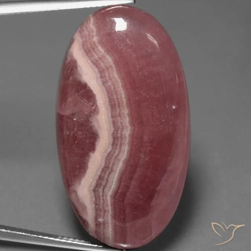 Rodocrosite multicolore taglio ovale da 46,91 ct dal Sud Africa, dimensione 35,1 x 19,2mm, pietra preziosa naturale non trattati , purezza Opaque, Rodocrosite Ovale cabochon da 1 pz, durezza Mohs di 4 - 4, Photo A
