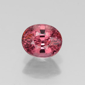 0.70 ct Red Rhodolite Garnet Gemstone, Rhodolite Garnet Gem in Oval Facet Shape for Sale.
