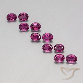 10pc Oval Deep Purple Rhodolite Garnet Lot from Mozambique - Weight 4.08ct total / avg. 0.41ct each, Size 5 x 4mm, Color: Deep Purple, Mohs Hardness 6.5 - 7.5 suitable for daily wear jewelry, Photo A