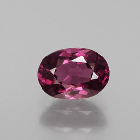0.87 ct Red Rhodolite Garnet Gemstone, Rhodolite Garnet Gem in Oval Facet Shape for Sale.